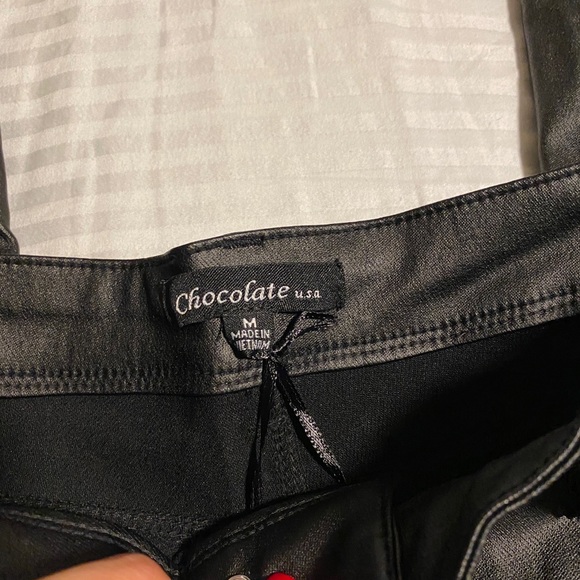 Size Medium. Looks like leather. Black pants - Picture 2 of 3